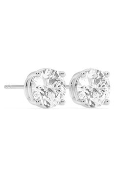 Round lab-grown diamonds sparkle within 14K white gold settings to create these elegant stud earrings. Post back Total lab-grown-diamond weight: 5.00ct. Color: IJ Clarity: V-S 14k-white gold/lab-grown diamond Made in the USA Diamond Guide White Diamond Solitaire Earrings, White Diamond Earrings With Vvs Clarity, Round Cut, White Round Cut Diamond Earrings With Vvs Clarity, Classic White Brilliant Cut Diamond Earrings, 14k White Gold Prong Setting Earrings For Anniversary, Classic White Cubic Zirconia Diamond Earrings, Solitaire White Gold Diamond Earrings For Anniversary, 14k White Gold Earrings With Prong Setting For Anniversary, Fine Jewelry White Gold Lab Grown Diamond Earrings