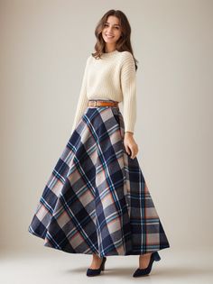 This winter wool skirt is a classic piece of tailoring that will see you through rain or shine. It is cut with a flattering flared skirt to give you a wonderful shape. The winter skirt is perfect classic styling and ends at the ankle. This is a versatile skirt that you'll wear again and again. DETAILS: * 30% wool, 30% fiber, 40% polyester * fully satiny liner * Two side pockets * Right zip closure * Elastic waistband at the back to provide some stretch * Plus size full skirt * Ankle length skirt * Perfect for Winter, autumn * Dry clean * The belt model wears is not for sale * Lean More about the items From the FAQs on the page bottom * More plaid skirt : https://etsy.me/3NXzTZx * The model is 170cm (5′7″) tall with a 80cm (31.5") bust, 66cm (26") waist. She is wearing the plaid dress in si Winter Flared Skirt, Chic Long Plaid Skirt, Plaid Full Skirt For Work, Plaid Flared Relaxed Fit Skirt, Plaid Flared Skirt, Plaid Relaxed Fit Skirt For Fall, Plaid Flared Skirt With Relaxed Fit, Relaxed Plaid Skirt For Fall, Fall Plaid Relaxed Fit Skirt