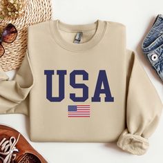 USA Flag Sweatshirt, Patriotic Sweatshirt Welcome to ApparelByMoliva https://apparelbymoliva.etsy.com High quality and super soft comfortable sweatshirts are prepared with new technology DTF and a professional quality heat press.  # HOW TO PLACE AN ORDER? #   Please check the size, color and theme of all images in this listing. * Choose the size and color of the shirt from the menus. * Fill the empty box with your design color for personalization. Please refer to the photos in this listing to se Patriotic Sweatshirt, Retro Flag, American Flag Hoodie, Usa Sweatshirt, Sweatshirt Crewneck, Usa Flag, Design Color, New Technology, Heat Press