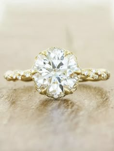 an engagement ring with a round diamond in the center