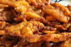 some fried food is on a plate and ready to be eaten