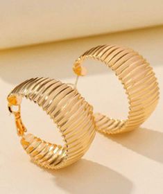 Beautiful and stylish women's textured gold hoop earrings. Eardrop Height 3.4cm Eardrop Width 1.8cm Everyday essential wear - non allergic. Free Delivery In the UK, Free Worldwide Delivery options available. Boutique Packaging, Feather Ear Cuff, Earrings Casual, Bohemian Style Jewelry, Casual Earrings, Hippie Earrings, Gold Statement Earrings, Snake Earrings, Ear Cuff Earings