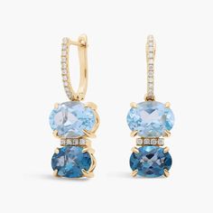 Embrace blue hues when you wear these gorgeous drop earrings, each set with an oval-cut London blue topaz and sky blue topaz stone. The cool tones of the stones are beautifully complemented by the warm lustre of the 14k yellow gold design. Blue Topaz Stone, Sky Blue Topaz, Topaz Stone, Diamond Drops, London Blue Topaz, Cool Tones, London Blue, Diamond Drop Earrings, Gold Design