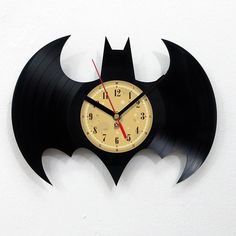 a clock made to look like a bat