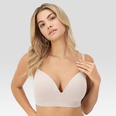 SEAMLESSLY SMOOTH, SIMPLY SEXY Looking for a bra that’s makes a statement without really trying? Say hello to this sleek bralette. This Seamless Bralette makes sexy simple with its pretty, ribbed bottom band and classic plunging neckline. Wireless, molded cups comfortably shape while giving you the light support you need and expect in a comfortable bralette. The body smoothing fabric caresses your skin with buttery softness and disappears beneath your clothes. Customize the fit with adjustable s Low-cut Nursing Bra With Removable Pads, Low-cut Nursing Bra With Medium Bust Support, Low-cut Padded Stretch Bra, Low-cut Stretch Padded Bra, Stretch Low-cut Padded Bra, Elegant Low-cut Soft Touch Bra, Bra Models, Comfortable Bras, Plunging Neckline