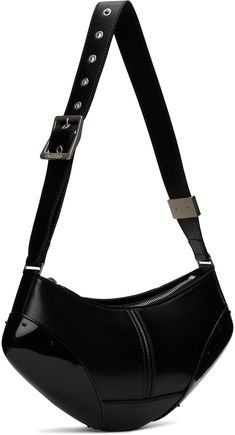 Buffed faux-leather messenger bag in black. · Adjustable pin-buckle shoulder strap · Logo embossed at face · Studded patent faux-leather trim at base · Zip closure · Zip pocket at interior · Twill lining · Logo-engraved silver-tone hardware · H5.5 x W11.5 x D3 Supplier color: Nero Designer Faux Leather Shoulder Bag, Designer Rectangular Faux Leather Shoulder Bag, Designer Bags With Adjustable Strap And Faux Leather, Designer Faux Leather Bags With Adjustable Strap, Designer Faux Leather Crossbody Satchel, Modern Faux Leather Shoulder Bag With Metal Hardware, Trendy Leather Shoulder Bag With Gunmetal Hardware, Trendy Leather Satchel With Silver-tone Hardware, Trendy Formal Shoulder Bag With Gunmetal Hardware