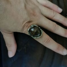 A stunning chunky organic look, soft soldered freeform hand crafted ring showcasing a beautiful piece of tumbled Garnet with a rich earthy vibe. The metal has had patina applied, really giving the recesses depth. This one of a kind ring is perfect for any Witchy, Goths, Fairies and Hobbits and everyone in between! Size approx AUS/UK: Q Made with solder bearing lead free pewter, copper & silver. I use ethically sourced tumbled Garnets. This piece I would recommend removing before getting wet.  I recommend an occasional onceover with renaissance wax to help protect the metal. Witchy Ring, Shifting Closet, Solder Jewelry, Freeform Ring, Soldering Jewelry, Soldering, Rings Statement, Statement Rings, Garnet