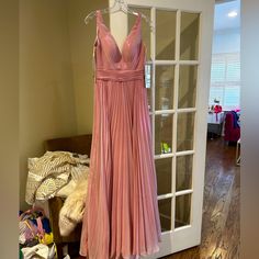 Selling This Beautiful Dress Never Worn !!!! Pleated V-neck Gown For Party, Pleated V-neck Dress For Prom Season, Elegant Pink Pleated Evening Dress, Pleated V-neck Party Gown, V-neck Pleated Party Gown, Pink Pleated Dress For Prom Season, Pink Formal Dress With Pleated Bodice, Formal Pink Dress With Pleated Bodice, Pink Formal Dress With Lined Bodice