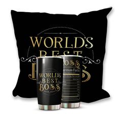 two black and gold travel mugs sitting next to each other on a pillow that says world's best boss