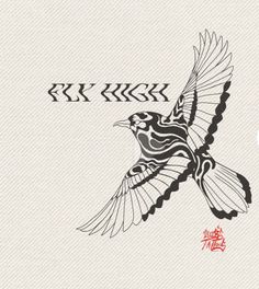 an image of a bird flying in the air with chinese writing on it's side