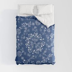 a blue and white floral comforter set