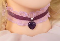 💗~ 💜Description These Pastel Purple and Pink colors Chokers made of Chiffon lace, Velvet ribbon, Rose Quartz and Amethyst pendant  ♡~  Chokers are 2 sizes: ★~ The shortest Choker minimal size- 34 cm(13.38in), maximal- 42cm(16.53in), height- 3cm(1.18in) ★~The longest Choker minimal size- 36 cm(14.17in), maximal- 45cm(17.71in), height- 3cm(1.18in) Heart pendant size- height- 1.7cm(0.66in), width - 1.5cm(0.59in) ★The choker's finished off with full width bright silver plated clamp ends, Zinc Alloy chains, Pink and Purple Teardrop Crystal Glass Beads. ♡~ Rose Quartz is the stone of universal love. ♥ Unconditional love ♥ Self-love ♥ Mother love ♥ Caring ♥ Kindness ♥ Friendship ♥ Romantic love ♥ Platonic love Rose Quartz purifies and opens the heart at all levels to promote love, self-love, fr Purple Choker, Ribbon Rose, Pastel Purple, Amethyst Pendant, Lace Collar, Velvet Ribbon, Chiffon Lace, Mothers Love, Stone Pendants