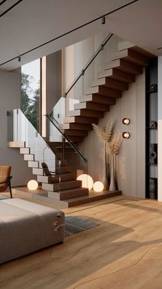 a living room filled with furniture and a stair case