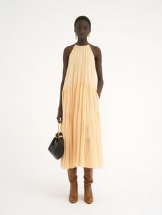 Chloé Long Gathered Sun Dress In Silk Georgette | Chloé US Chic Summer Chiffon Dress With Pleated Bodice, Chic Summer Silk Chiffon Midi Dress, Silk Chiffon Midi Dress For Summer, Voluminous Midi Dress For Summer Evenings, Summer Silk Midi Dress With Gathered Neckline, Sleeveless Silk Chiffon Dress, Summer Dresses With Pleated Bodice And Voluminous Skirt, Summer Dresses With Ruched Bodice And Voluminous Skirt, Summer Silk Dress With Voluminous Skirt