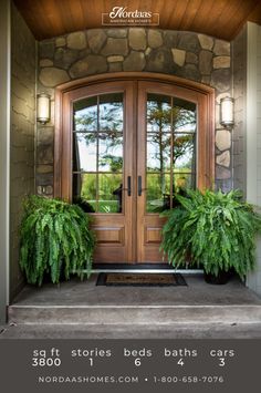 the front door to a home with two plants on it and an advertise that says, get stories beds baths cars