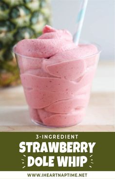 strawberry dole whip in a glass with strawberries on the side and text overlay reading 3 ingredient strawberry dole whip