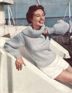 "Yachting Pullover is a vintage 1950s woman's sweater knitting pattern  from Vogue Knitting Spring/Summer 1954 magazine. ★ Sizes: * Bust 30\" * Bust 32\" * Bust 34\" Gauge: * 24 sts / 28 rows = 4\" in worsted weight (8 ply) yarn ★ Yardage needed: * Size 30\": 1200 yards * Size 32\": 1320 yards * Size 34\": 1440 yards ★ This pattern is a digital download and is delivered to you immediately upon receipt of payment. ★ Sale! 2 patterns for $7 with code: 2FOR7 3 patterns for $9 with code: 3FOR9 5 pat 1950s Woman, 1950s Women, Vogue Vintage, Magazine Vogue, Fur Coat Vintage, Vogue Knitting, 1950s Style, Estilo Preppy, Vintage Fur