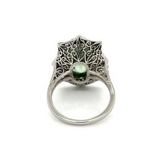 This stunning ring by Regard Jewelry features a 10.00ct Merelani Mint Tsavorite GIA & .79tcw Diamond Angular in a 10.4g platinum setting, size 6.75. It makes for an eye-catching sparkle of timeless elegance. Platinum 10.00ct Merelani Mint Tsavorite GIA & .79tcw Diamond Angular Ring at Regard Jewelry in Austin, Texas Austin Texas, Timeless Elegance, Austin, Platinum, Texas, Sparkle, Mint, Size 6, Ring