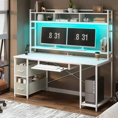 a computer desk with two clocks on it