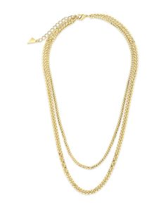 Layer up! This layered curb chain necklace is simple yet chic -- perfect for wearing with any outfit, and in any place. Available in gold and silver tones and adjustable in order to ensure a perfect fit. Materials: 14K gold ﻿or﻿﻿ rhodium plated brass Features: Measures 16-18" with 2" extender, Lead & Nickel free, lobster clasp Chic Gold-tone Layered Double Chain Necklace, Chic Gold-tone Double Chain Layered Necklace, Trendy Double Strand Gold Chain Necklace, Gold Double Strand Curb Chain Necklace, Gold-tone Multi-strand Adjustable Layered Necklace, Chic Double Strand Chain Necklace With Adjustable Chain, Gold-tone Multi-strand Chain Necklace With Adjustable Chain, Trendy Double Strand Layered Necklace With Adjustable Chain, Chic Double Strand Adjustable Chain Necklace