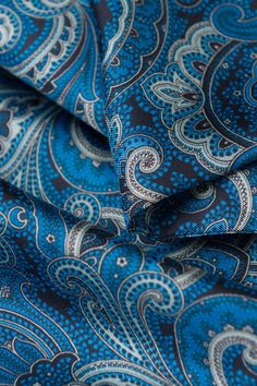 Add some Italian style to your outfit with this sophisticated silk scarf. Make a statement with this classic and timeless paisley print scarf. 100% Made in Italy. Sized for a perfect drape: Approx: 8.5” x 70”. This allows for an elegant look that sets you apart. Most men's scarves of this type are available in a 60"-63" length which is simply too short for most men for adequate coverage and drape. 100% silk twill: A soft, silky fabric traditionally used in men's tailoring for its look and its dr Luxury Blue Silk Evening Scarf, Luxury Classic Blue Silk Scarf, Luxury Blue Silk Scarf For Men, Luxury Blue Silk Scarf, Artistic Blue Silk Scarves, Mens Scarves, Scarf Men, Silk Twill, Anniversary Sale