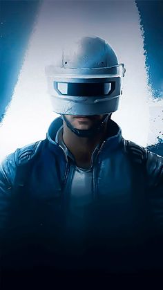 a man wearing a leather jacket and helmet in front of a blue background with white spots