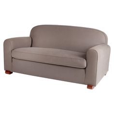 a gray couch sitting on top of a white floor