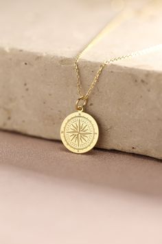 Gold Compass Pendant - Compass Gold Necklace ● Material of pendant: Solid Gold 14k ( REAL GOLD ) ● Metal Stamp: 14k ( REAL GOLD ) ● The pendant is available in 5 sizes: - 12,7 mm / 0.5 inches (Diameter) - 14,0 mm / 0,55 inches ( Diameter ) In the photos - 15,3 mm / 0.6 inches ( Diameter ) - 16,5 mm / 0,65 inches ( Diameter ) - 19,1 mm / 0,75 inches ( Diameter ) ( In the photos the size is 14mm / 0.55 inches Diameter ) ( Jump Ring inner diameter: 4 mm ) ● Material of chain: Solid gold 14k ( REAL Gold Compass Design Necklace For Travel, Engraved Medallion Necklace For Travel, Gold Round Pendant Necklace For Travel, Gold Necklace With Round Pendant For Travel, Personalized Pendant Necklaces For Travel, Personalized Gold Jewelry For Travel, Personalized Gold Necklace For Travel, Gold Medallion Jewelry For Travel, Gold Engraved Jewelry For Travel