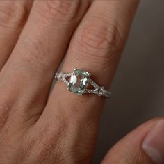 This is a gorgeous handmade creation. Its beauty is its simplicity & Elegance. The 6*8mm cushion cut natural green amethyst is crafted in sterling silver with rhodium plated. It's made to order and it will take about 7-10 days to make it. All item is sent in a beautiful gift box You can realize more lovely stuff clicking the link https://www.etsy.com/shop/knightjewelry?refshopsection_shophome_leftnav Please leave the correct address and you phone number for delivering successfully. Green Amethyst Rings With Gemstone Accents For Wedding, Green Emerald-cut Amethyst Ring For Wedding, Green Amethyst Wedding Rings With Gemstone Accents, Wedding Emerald Cut Green Amethyst Ring, Wedding Green Emerald Cut Amethyst Ring, Wedding Green Emerald-cut Amethyst Ring, Green Amethyst Rings For Wedding, Silver Cushion Cut Rings With Gemstone Accents, Elegant Green Amethyst Ring In Sterling Silver