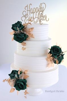 a three tiered white cake with green flowers on the side and a happy father written on top