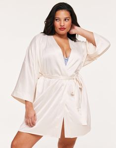 The Izabella Light White kimono robe is made with sustainable, recycled polyester and spandex for a soft, breathable feel. With a self-tie closure and full coverage, this robe is perfect for a comfortable night's sleep. (Available in plus-sizes 1X-4X.) Robe Sleepwear, Sleep Sets, White Kimono, One Piece Clothing, Adore Me, One Piece Pajamas, Sleepwear & Loungewear, Plus Size Shorts, Light White