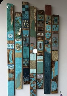 a wall hanging made out of wooden pieces