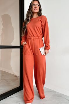 42% POLYESTER, 40% COTTON, 18% RAYON Model Wearing Size Small Color: Rust Soft, French Terry Knit V-Back Long Sleeves Elastic Waistband Side Pockets Relaxed/Wide Leg Fit Jumpsuit Has Stretch 19" Armpit To Sleeve End 32" Inseam For Model Size Specs Please Check Size Charts Launched: 1/28/24 Solid Relaxed Fit Jumpsuits And Rompers For Fall, Casual Solid Jumpsuits And Rompers For Fall, Casual Orange Stretch Jumpsuits And Rompers, Casual Long Sleeve Jumpsuits And Rompers With Elastic Waistband, Fall Relaxed Fit Jumpsuits And Rompers In Solid Color, Fall Relaxed Fit Jumpsuits And Rompers, Orange Long Sleeve Jumpsuit For Fall, Casual Stretch Orange Jumpsuit, Casual Orange Stretch Jumpsuit