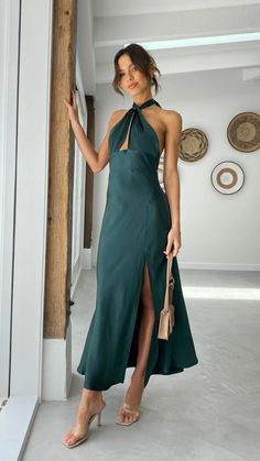 Dark Green Wedding Dress Guest, Halter Neck Dress With Keyhole Back For Date Night, Date Night Halter Dress With Keyhole Back, Green Halter Neck Dress For Formal Occasions, Chic Backless Halter Dress With Side Slits, Green Halter Dress With Tie Back For Evening, Chic Halter Dress With Side Slits, Halter Neck Dress With Split Design For Night Out, Chic Spring Halter Dress With Side Slits