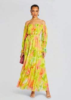 Exude island chic in Hemant and Nandita's Mina Long dress. This flowy off-the-shoulder maxi dress features a belted waist and balloon sleeves for a trendy touch. Shown here in Yellow Floral. 100% Viscose Made in India Model is 5'10" wearing size S Style No. HN-MINA-5839 About Hemant & Nandita Created in India, Hema Island Chic, Bridal Reception Dress, Destination Bride, Resort Chic, Hemant And Nandita, Bride Bachelorette, Bachelorette Party Bride, Spring Knits, Business Chic