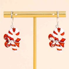 New! Candy Cane Drop Earrings. Festive Candy Cane Earrings With A Red Bow Around Them. Approximately 1.6” Tall. Bundle To Save 30%. Pug Earrings, Candy Cane Earrings, New Fashion Earrings, Rhinestone Costumes, Triple Hoop Earrings, Dinosaur Earrings, Gold Chandelier Earrings, White Gold Hoops, Vintage Style Earrings