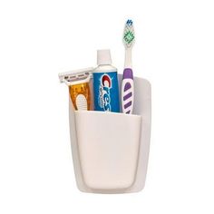 a toothbrush holder with two toothpaste tubes in it