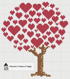 a cross stitch tree with hearts on it