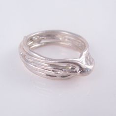 "This band ring has been hand-sculpted in jeweler's wax, then cast in molten sterling silver. Inspired by flowing/tangled vines and roots, it's a solid piece that features a \"rise\" of vines as a centerpiece of the ring. It adds a bit of height and detailed layers that really draw the eye! The casting process (lost wax casting) means the sculpted wax is destroyed, so each cast piece is one-of-a-kind and cannot be repeated. - Width of band: Slightly over 1/4\" - Ring size: 12.5 All of my work is handmade, using recycled materials whenever possible, and incorporating/ re-using gemstones and vintage pieces." Vine Ring, Wax Casting, Lost Wax Casting, Lost Wax, Rings Statement, Band Ring, Band Rings, Statement Rings, Vines