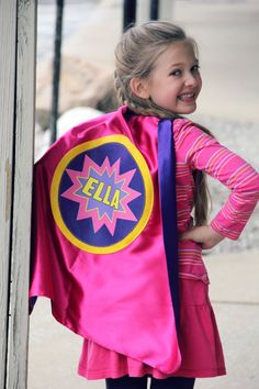 Introducing our NEW POW DESIGN Personalized Superhero Cape, customized with the name of your choice! Choose from 4 fun options. Perfect for a one of a kind customized gift for both boys and girls, as well as superhero parties! YOU CHOOSE: Cape Color Combination: PINK outside/PURPLE underside PURPLE outside/PINK underside RED outside/TURQUOISE underside TURQUOISE outside/RED underside Design Colors: Pink/Purple/Yellow Burst Design Personalized (as with pink/purple cape) Red/Turquoise/Yellow Burst Pink And Purple Super Hero Accessories, Pink And Purple Super Hero Accessories Heart Mask, Superhero Cape Pattern From T Shirt, Custom Lego Capes, Superhero Headbands, Boys Cape, Super Hero Capes For Kids, Super Hero Capes, Purple Cape