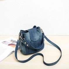 Denim Jeans Bag Cool Girl Bucket Bag Types of bags: Shoulder & Crossbody Bags Shape: Bucket Pattern Type: Solid Occasion: Versatile Number of Handles/Straps: two Main Material: Denim Lining Material: Polyester Item Type: Handbags Interior: Interior Slot Pocket, Cell Phone Pocket, Interior Zipper Pocket, Interior Compartment Hardness: Soft Handbags Type: Shoulder Bags Decoration: Rivet Closure Type: Zipper Size: Size: 26cm*21cm* 19cm(W*H*T)Shoulder strap 120CM Denim Bucket Bag, Bag Jeans, Denim Crossbody, Beg Tangan, Canvas Purse, Crossbody Bags For Travel, Jeans Casual, Jeans Bag, Crossbody Bag Women