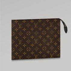 a louis vuitton wallet case with brown monograms on the front and side