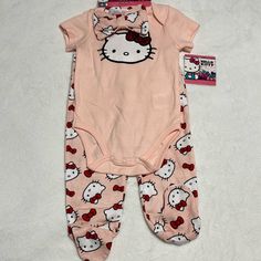 Brand New Hello Kitty Baby Girl Outfit Set Size 6-9 Months Color Salmon Pink 3 Pc Set Onesie, Footed Pants And Bow Headband Brand New Tags Attached Cute Pink Onesie With Cartoon Print, Cute Pink Sets With Cartoon Print, Cute Pink Cartoon Print Sets, Cute Pink Onesie For Playtime, Hello Kitty Baby Stuff, Hello Kitty Baby Clothes, Hello Kitty Matching, Baby Shopping List, Hello Kitty Room Decor