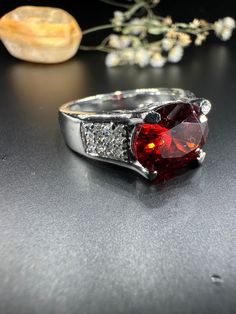 Elegant shape Garnet Dark Deep Red Oval Cut Garnet Deep Dark, Handmade ring for Men And Woman, Anniversary Gift, Luxury Valentine's Day Gift * Material: High Quality Solid 925 Sterling Silver * Finish: Sterling Silver ∙ 14K Gold * I N F O R M A T I O N * Every item is tastefully wrapped and presented in lovely jewellery boxes. Reusable and biodegradable, our jewellery boxes * Are you interested in your own design or looking for advice? Do not hesitate to contact us! We take pride in our quick re Luxury Garnet Men's Ring For Anniversary, Luxury Garnet Rings For Gift, Luxury Oval Garnet Jewelry, Luxury Red Sterling Silver Wedding And Engagement Jewelry, Luxury Red Men's Ring For Gift, Luxury Handmade Red Rings, Luxury Valentine's Day Jewelry Ring, Luxury Garnet Rings As A Gift, Luxury Garnet Jewelry Gift