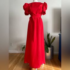 Vintage 70s Maxi Party/Formal Dress With Puff Sleeves, Deep V Back, & Elegant Train In The Back. Beautiful Bright Red In Color. The Dress Has A Zipper Closure In The Back. In Great Vintage Condition With No Noted Major Flaws Such As Stains Or Holes. Size 10 Tag, But Would Best Fit A Modern Extra Small Or Small. Measurements: Shoulder To Shoulder-13.5” Bust/Armpit To Armpit-18” Waist-13” Hips-23” Length-57” Sleeves-10” ***All Measurements Taken With Item Laying Flat & Should Be Doubled Where Needed*** Please Ask As Many Questions As You Need To, Prior To Buying An Item. Colorful Dresses Formal, Dress With Puff Sleeves, Dress Clothes For Women, Formal Dress, Bright Red, Puff Sleeves, Vintage 70s, Deep V, Lady In Red