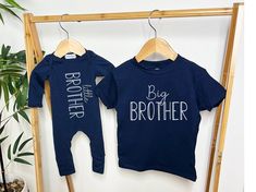 "This shirt is a stylish way to announce they are going to be the Big Brother! You can also choose to purchase the Little Brother on a navy romper/hat set, tee shirt or sweatshirt.  It coordinates nicely with our other sibling outfits or newborn outfits.  You can see them in links below. THIS LISTING IS FOR PURCHASING 1 SHIRT, SWEATSHIRT, BODYSUIT, ROMPER/HAT OR ROMPER/HAT/BLANKET SET AT A TIME.  PURCHASING MULTIPLE GARMENT INSTRUCTIONS ARE BELOW.  PURCHASING MULITPLE GARMENTS This listing is fo Family Matching Long Sleeve Custom Print T-shirt, Customizable Long Sleeve Family Matching T-shirt, Family Matching Long Sleeve T-shirt With Text Print, Family Matching Long Sleeve Text Print T-shirt, Family Matching Long Sleeve Tops With Custom Print, Customizable Long Sleeve Tops For Family Matching, Blue Long Sleeve Top With Name Print, Graphic Print Long Sleeve Top, Navy Romper