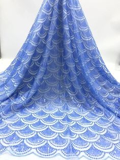 We offer a variety of fashion handmade fabric，those are widely use for wedding dress，garment and fashion cloth. we sell it by yard，our minimum order is 1 yards，and we always package it 15 yards for one roll，the width is about 125cm/45inch Material ： sequins ,beads ,mesh ，Rayon,polyester. Symmetrical embroidery floral pattern, with lovely flowers in the middle, scalloped border. You can also cut and use separately. Perfect for dress, tops, wedding veil. You can split the piece up and have one sca Embroidered Fitted Lace For Party, Fitted Embroidered Lace For Party, Fitted Embroidered Fabric With Lace Trim For Party, Fitted Embroidered Party Fabric With Lace Trim, Party Lace Embroidered Fabric And Notions, Embroidered Lace Fabric For Party, Party Lace Fabric With Embroidery, Summer Party Scalloped Lace, Fitted Sequined Lace For Party