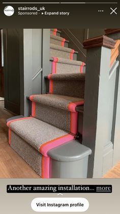 a set of stairs with pink and grey trim