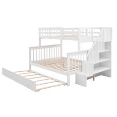 a white bunk bed with stairs next to it and an open drawer underneath the bed