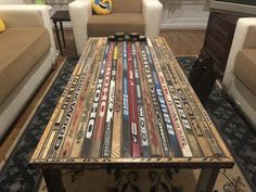 a coffee table made out of skis in a living room